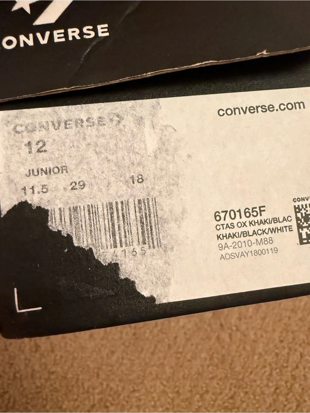 New in box. Converse low sneakers. Size 12